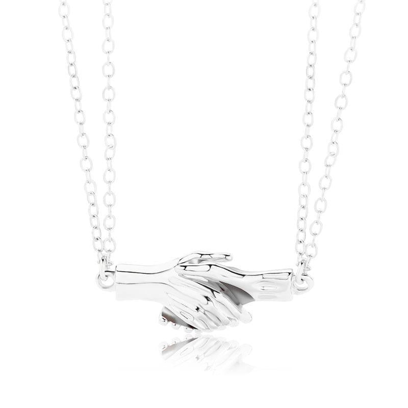 Creative Magnet Broken Heart Necklace for Men And Women showing Silver Chain Handshake Style | Confetti Living