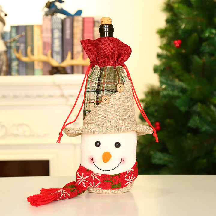 Christmas Wine Bottle Covers Showing Snowman | Confetti Living