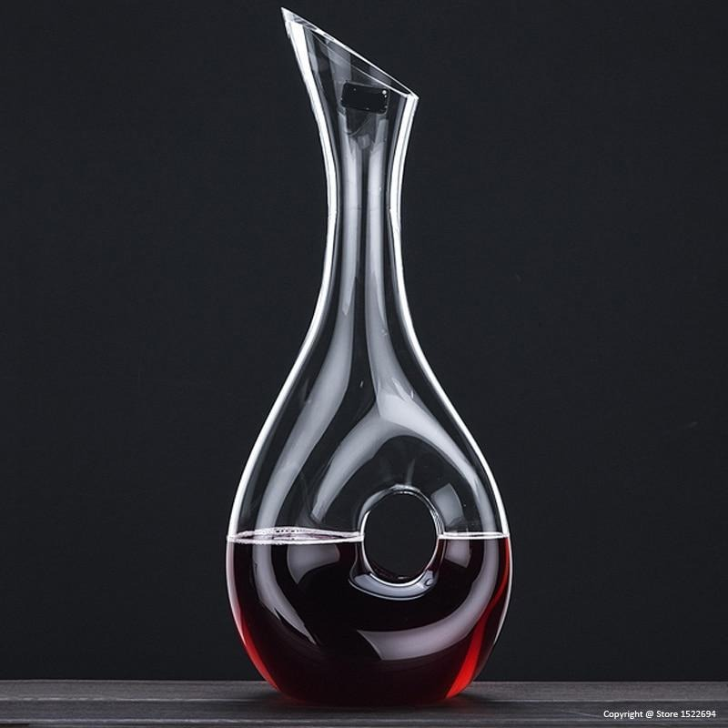 Home Bar Luxury Space Design Wine Decanter showing Donut Shape Decanter in use | Confetti Living