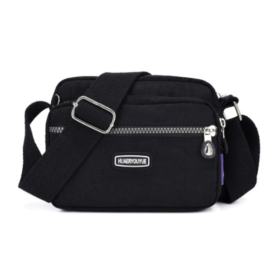 Women's Compact Multi Compartment Messenger Bag in Black | Confetti Living