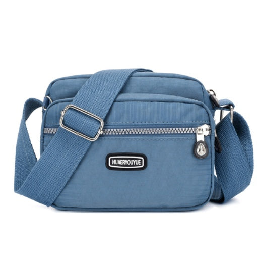 Women's Compact Multi Compartment Messenger Bag showing Blue Grey | Confetti Living