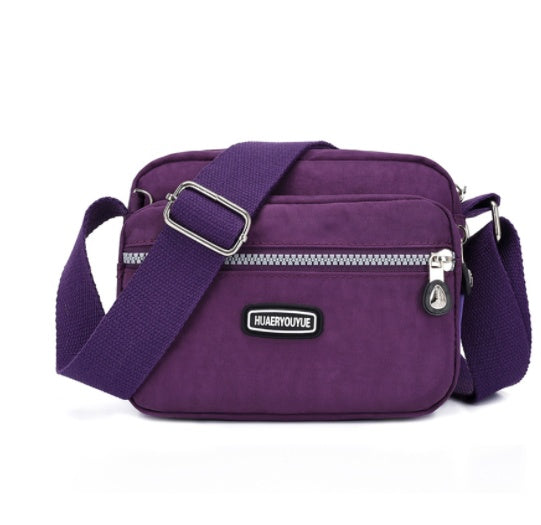 Women's Compact Multi Compartment Messenger Bag in Purple | Confetti Living