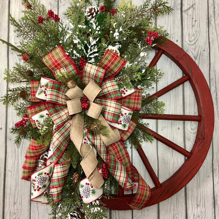 Christmas Door Hanging and Wall Decorations showing a Wahon Wheel Style Wreath | Confetti Living