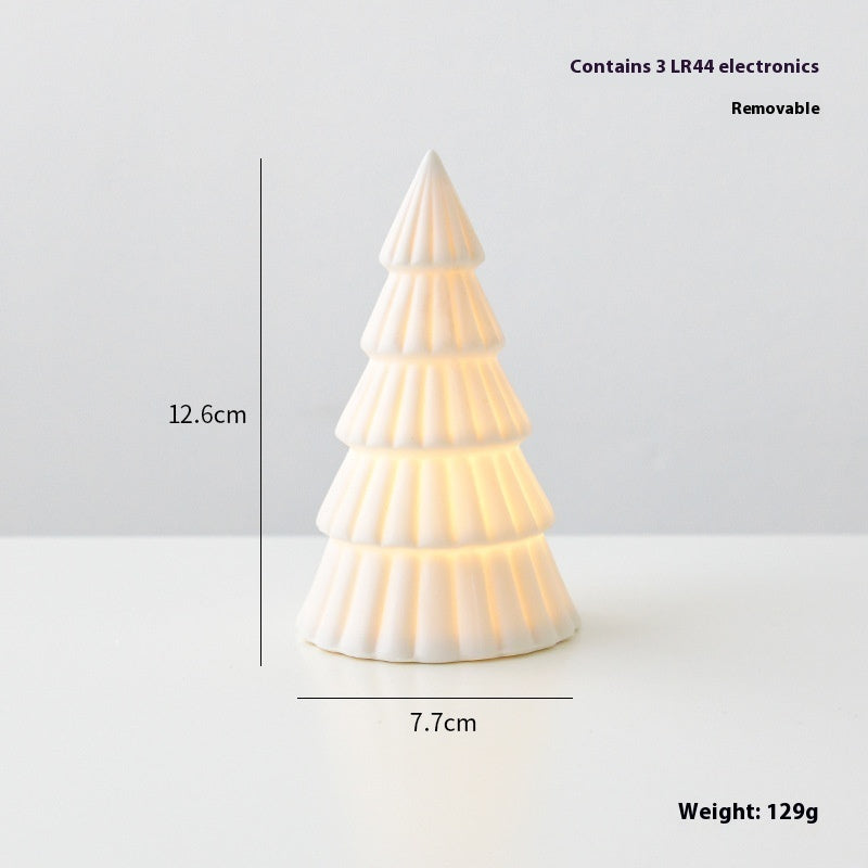 White Christmas tree-shaped lamp with dimensions and weight information on a light gray background