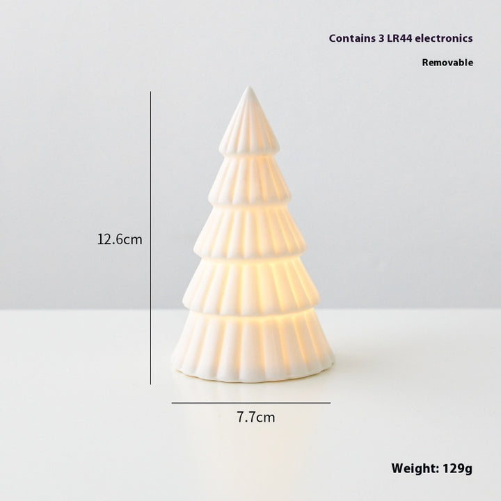 White Christmas tree-shaped lamp with dimensions and weight information on a light gray background