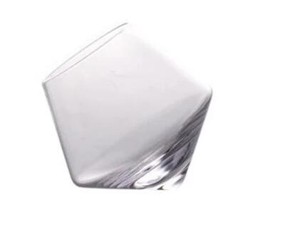 Home Bar Whimsical Crystal Whiskey Glass showing a single glass | Confetti Living