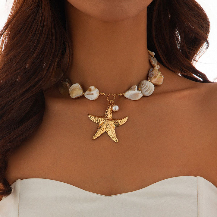 Necklace with starfish pendant and shell beads on a person