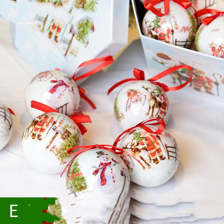 Decorative Christmas balls with red ribbons in a box