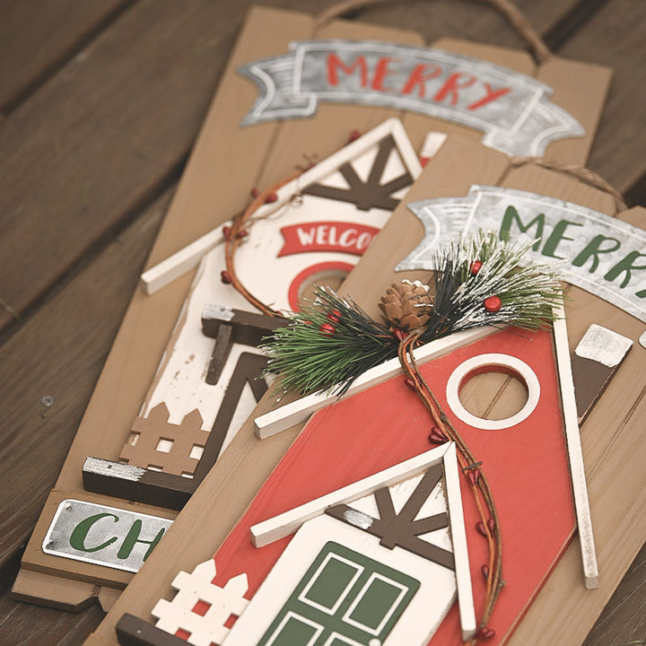 Decorative wooden signs with Christmas-themed designs on a cardboard backing.