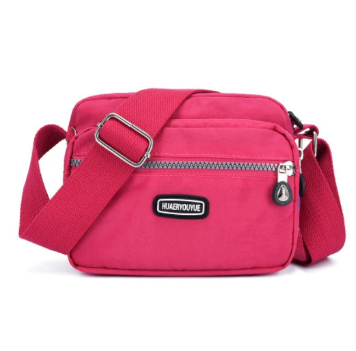 Women's Compact Multi Compartment Messenger Bag in Rose Pink | Confetti Living