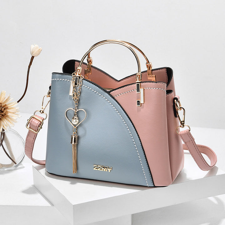 Women's Colour Block Handbag with Love Tassel showing Blue with Pink | Confetti Living