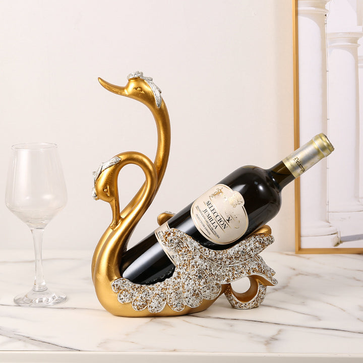 Home Bar Creative Swan Wine Rack in Gold showing use | Confetti Living