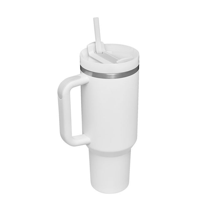 White insulated mug with handle and straw on a white background