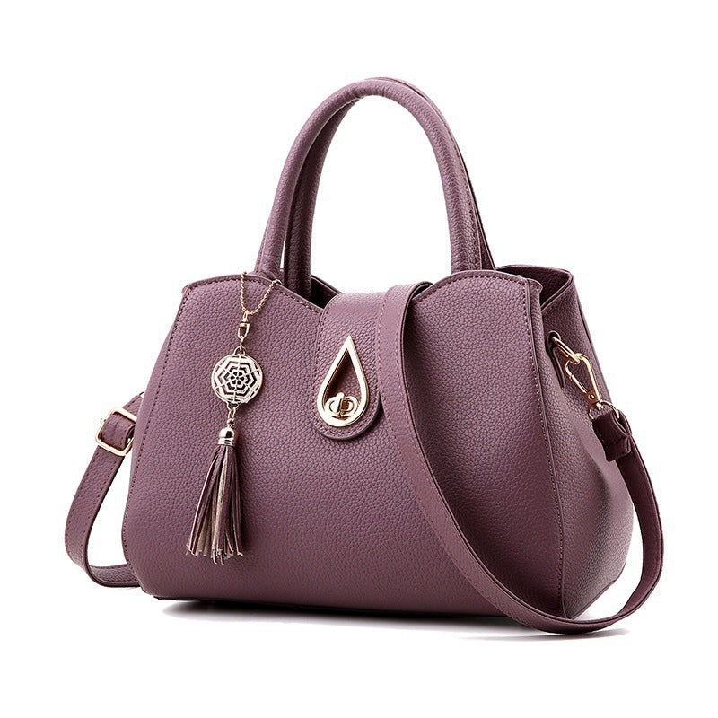 Women's Fashion Handbag with Tassel in Purple | Confetti Living