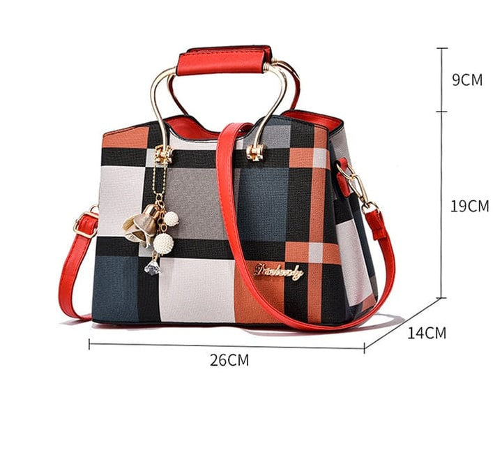 Plaid handbag with red accents and measurements on a white background