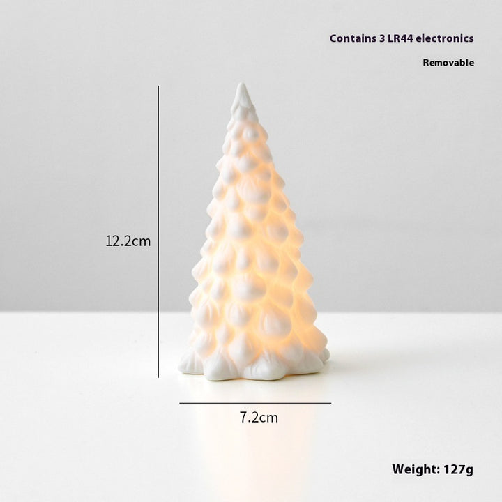 White Christmas tree-shaped lamp with measurements and weight information on a light gray background