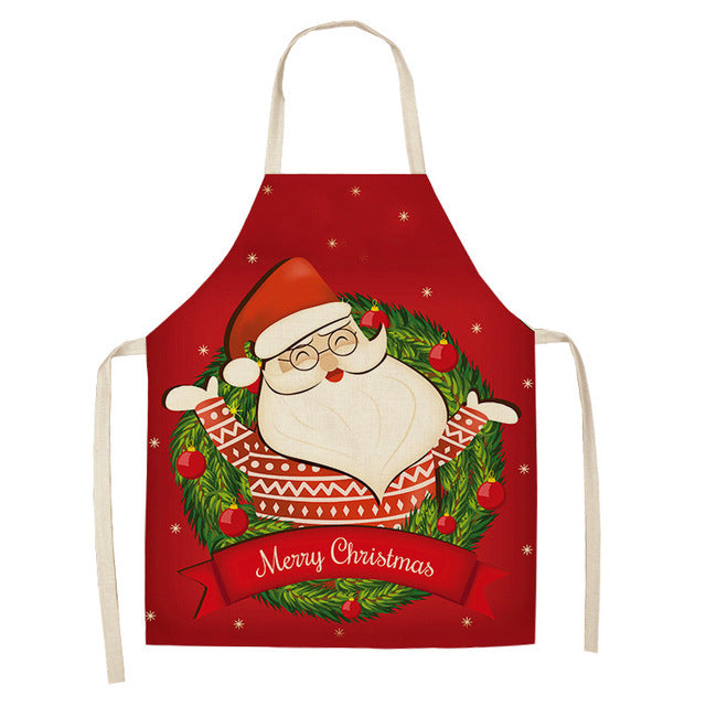 Christmas Design Kitchen Aprons showing Santa Design | Confetti Living