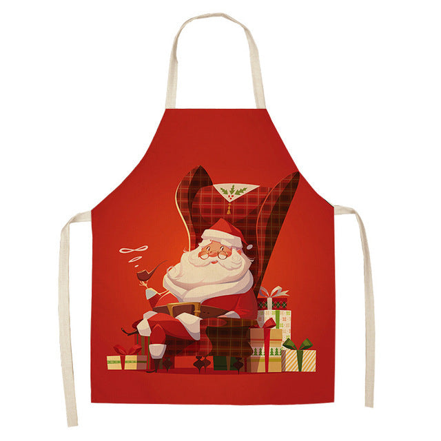 Christmas Design Kitchen Aprons showing Santa Gifts Design | Confetti Living