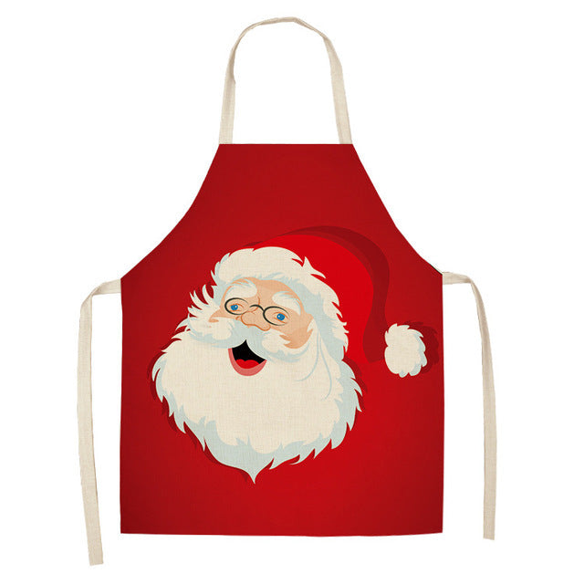 Christmas Design Kitchen Aprons showing Santa Face Design | Confetti Living