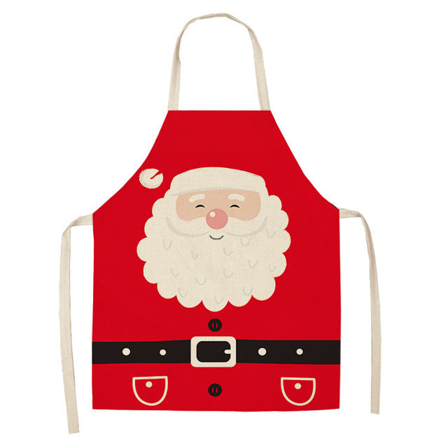 Christmas Design Kitchen Aprons showing Santa Face Design | Confetti Living