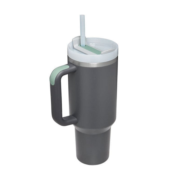 Gray travel mug with a handle and straw lid on a white background