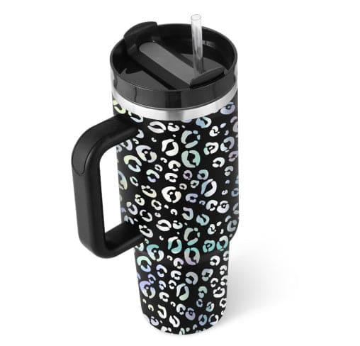 Travel mug with leopard print pattern on a white background