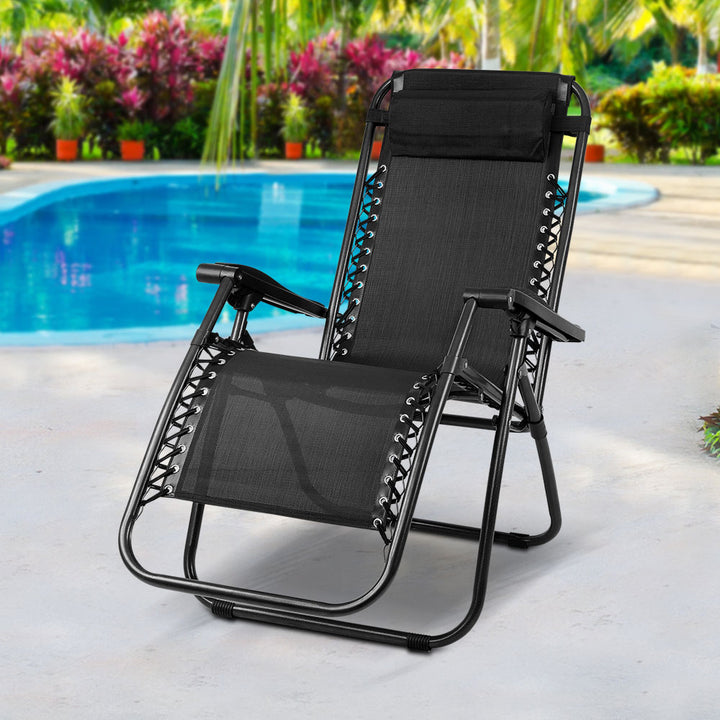 Gardeon Outdoor Portable Recliner in Black shown in an outdoor setting | Confetti Living