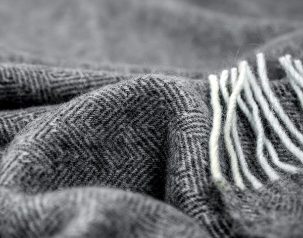 Hampton Dark Grey Merino Wool Throw Rug showing product detail | Confetti Living