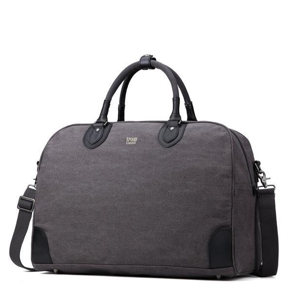 Classic blue large holdall bag from Troop London has a very spacious and deep main compartment which makes it an ideal weekend getaway holdall or everyday companion. Angled orientation.