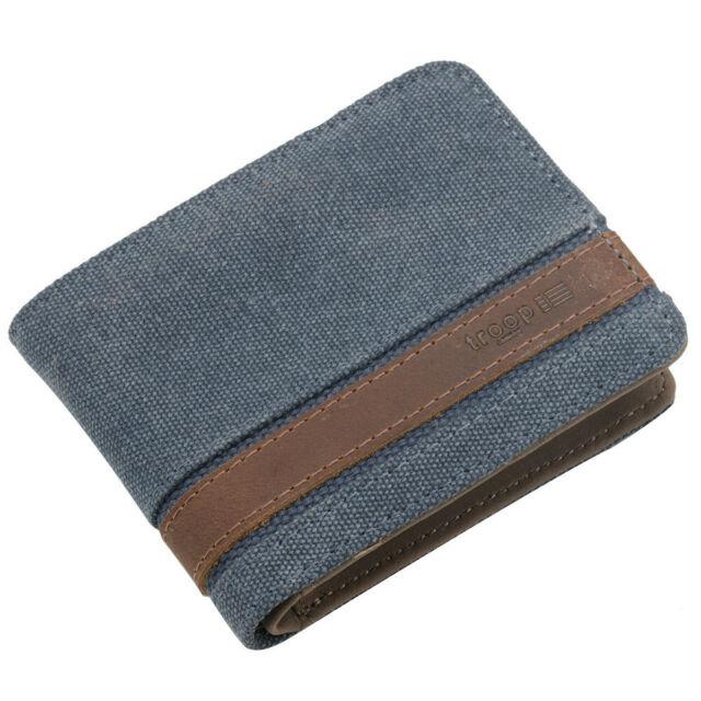 The Colorado Blue wallet from Troop London is a bi-fold wallet featuring an embossed leather stripe, a branded fully-lined interior, multiple card slots and a photo ID window. Choose from 4 color options with a nice gift box packaging which is ideal for gift giving. Front facing orientation.